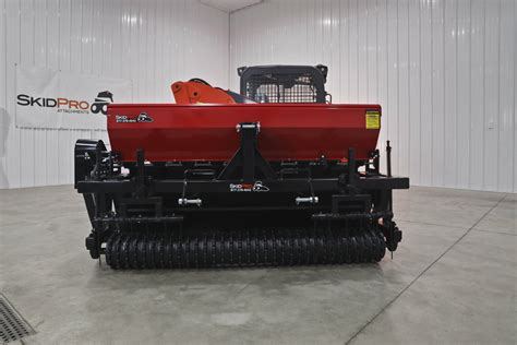 drill seeder for skid steer|seeder attachment for skid loader.